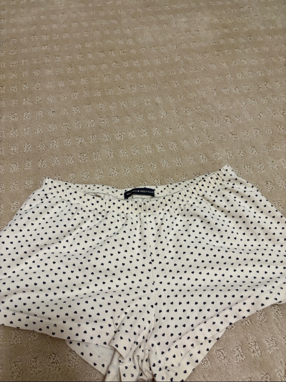 Brandy Melville White Shorts with Black Heart Print